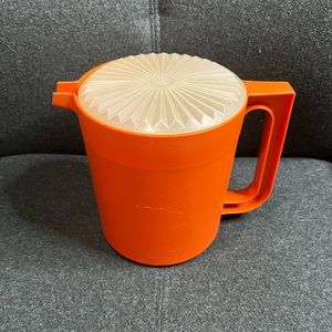 Vintage Tupperware pitcher with lid